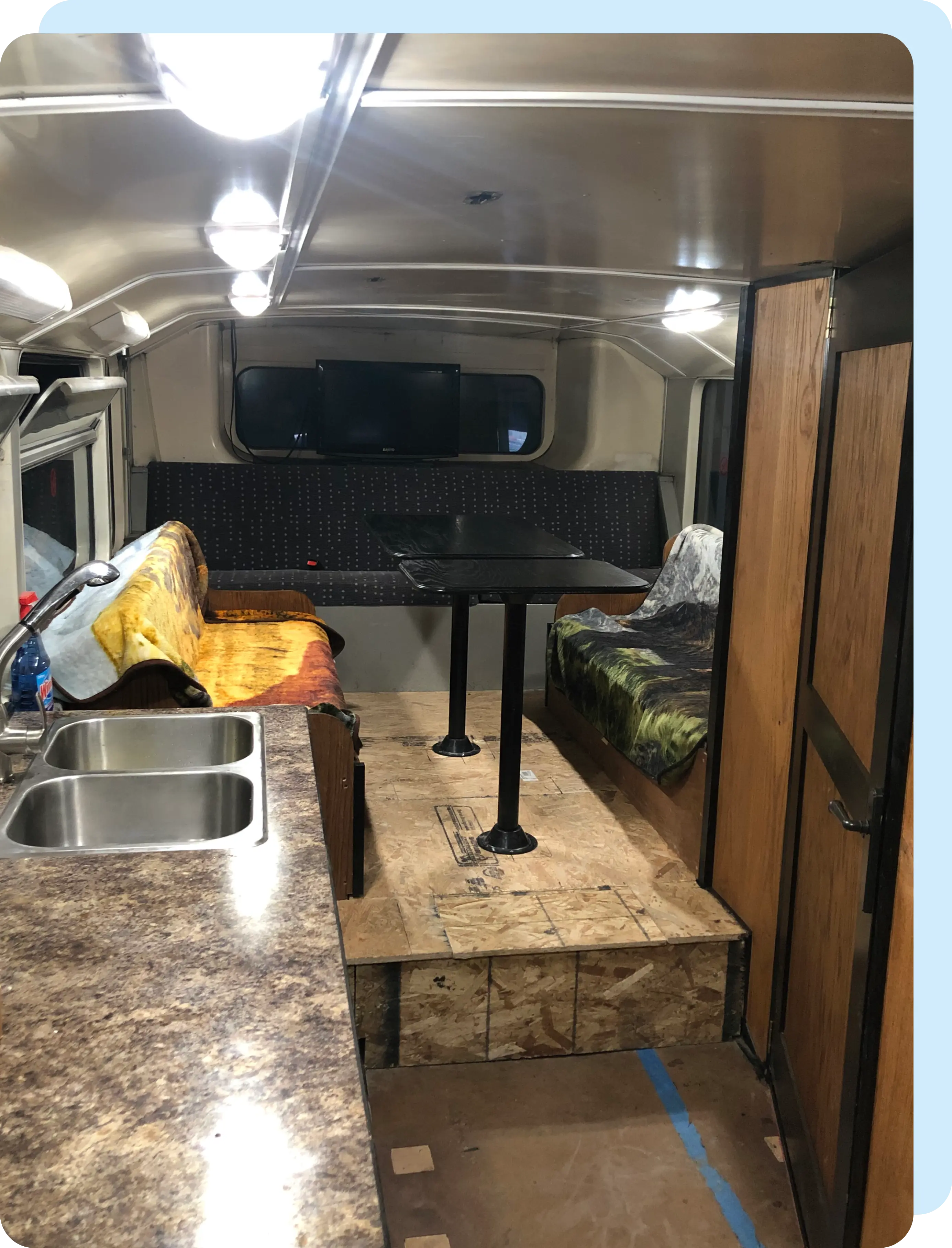 A view of the inside of a camper trailer.