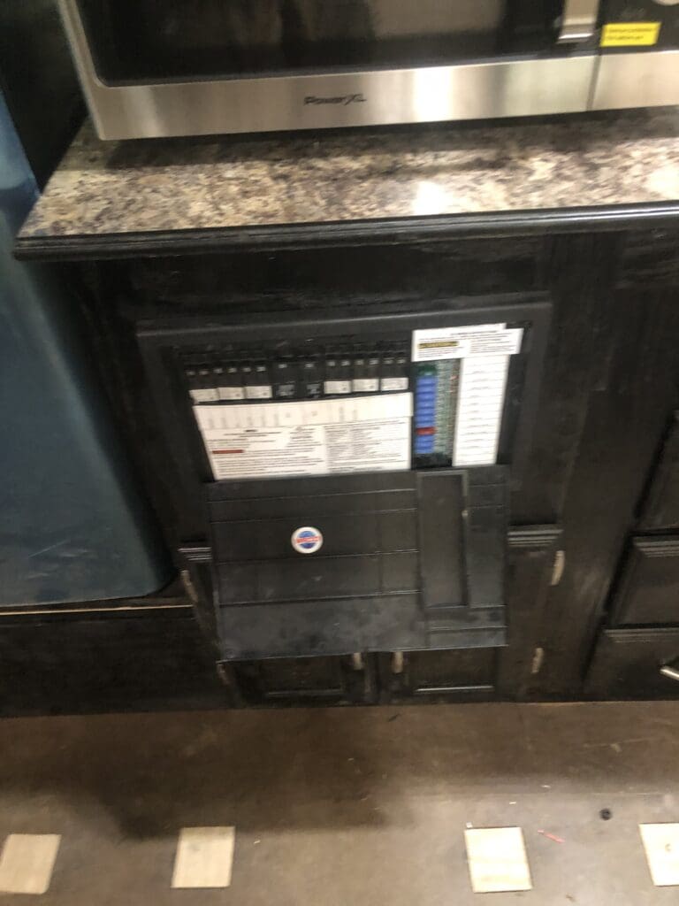 A black box with a blue sticker on it.