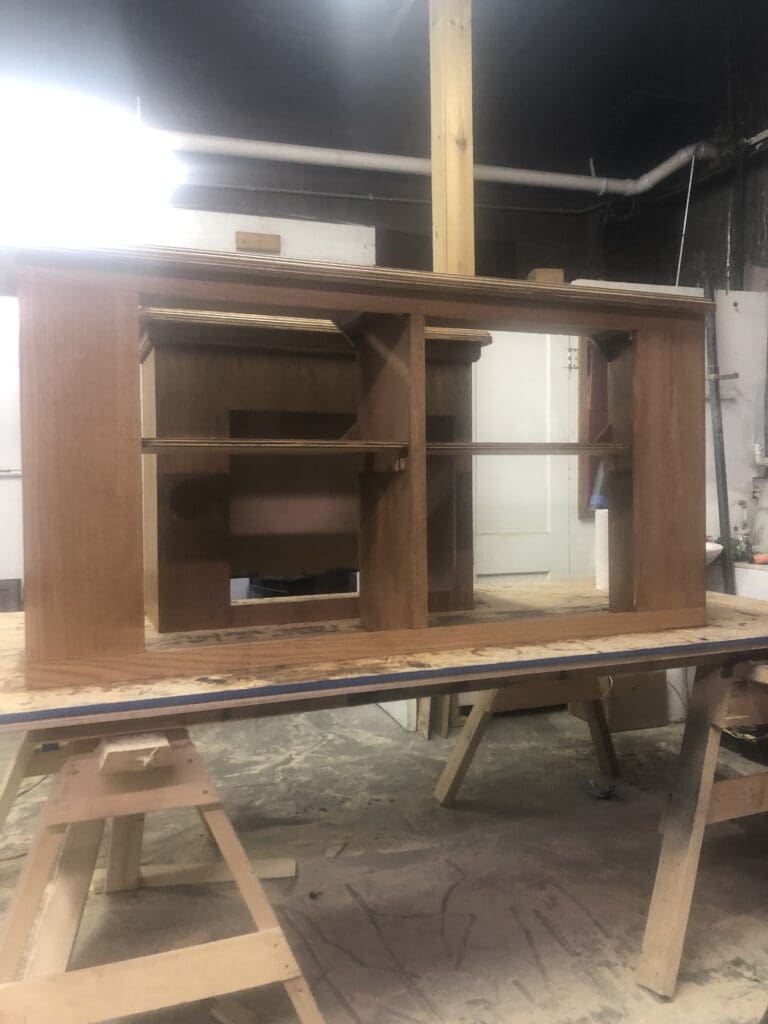 A wooden table with some wood pieces on it