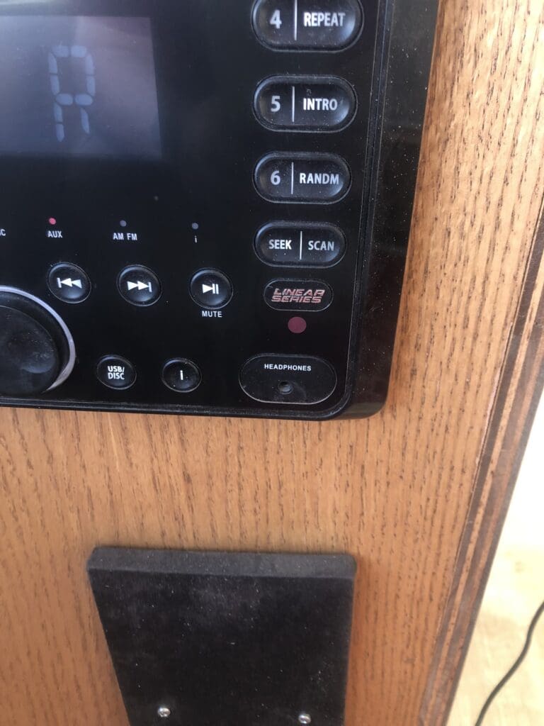 A close up of the radio buttons on a boat